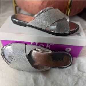 Silver glittery sandals with a chunky heel